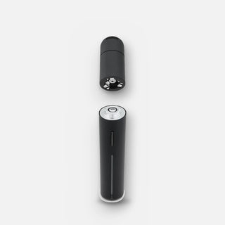 Puffco Pivot in black, mouthpiece and base separated to show the 3D Chamber connection